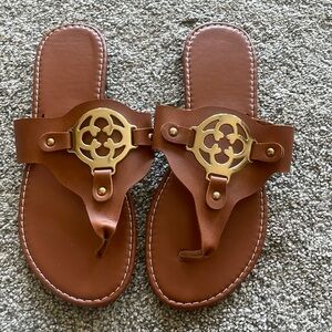 Cute brown sandals with gold design. Brand new never worn
